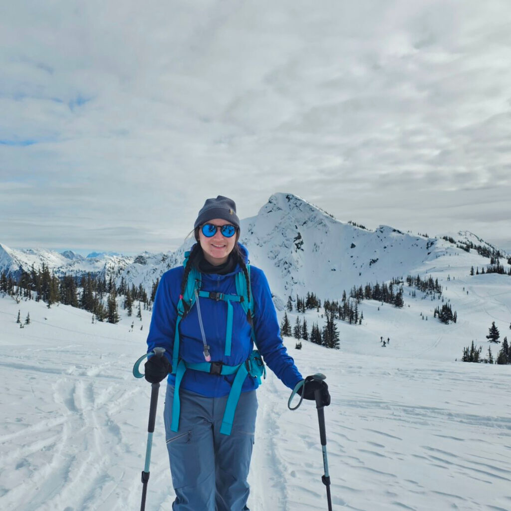 Azul-Sky Ski touring with a snowy mountain landscape in the background 
