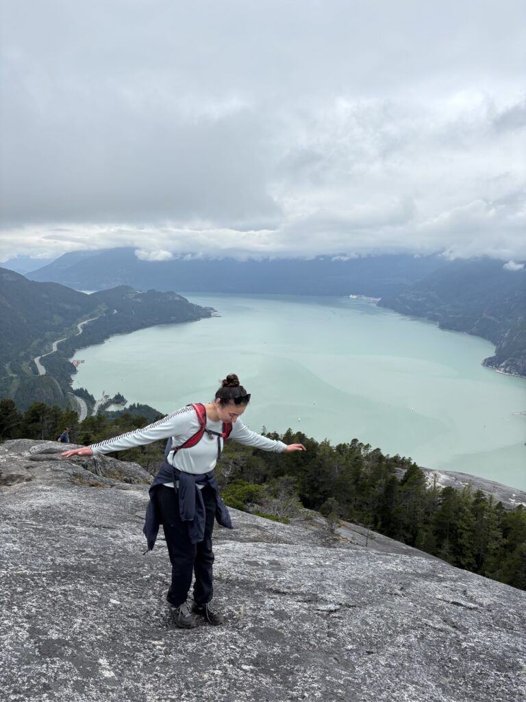 Azul-Sky regaining balance after tripping near a cliff in Squamish